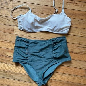 Bandeau bikini with high waist bottoms.